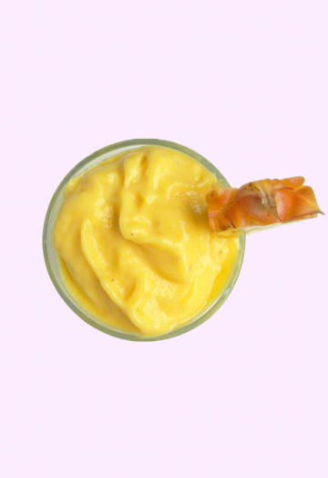 Pineapple mango smoothie with fresh coconut water.